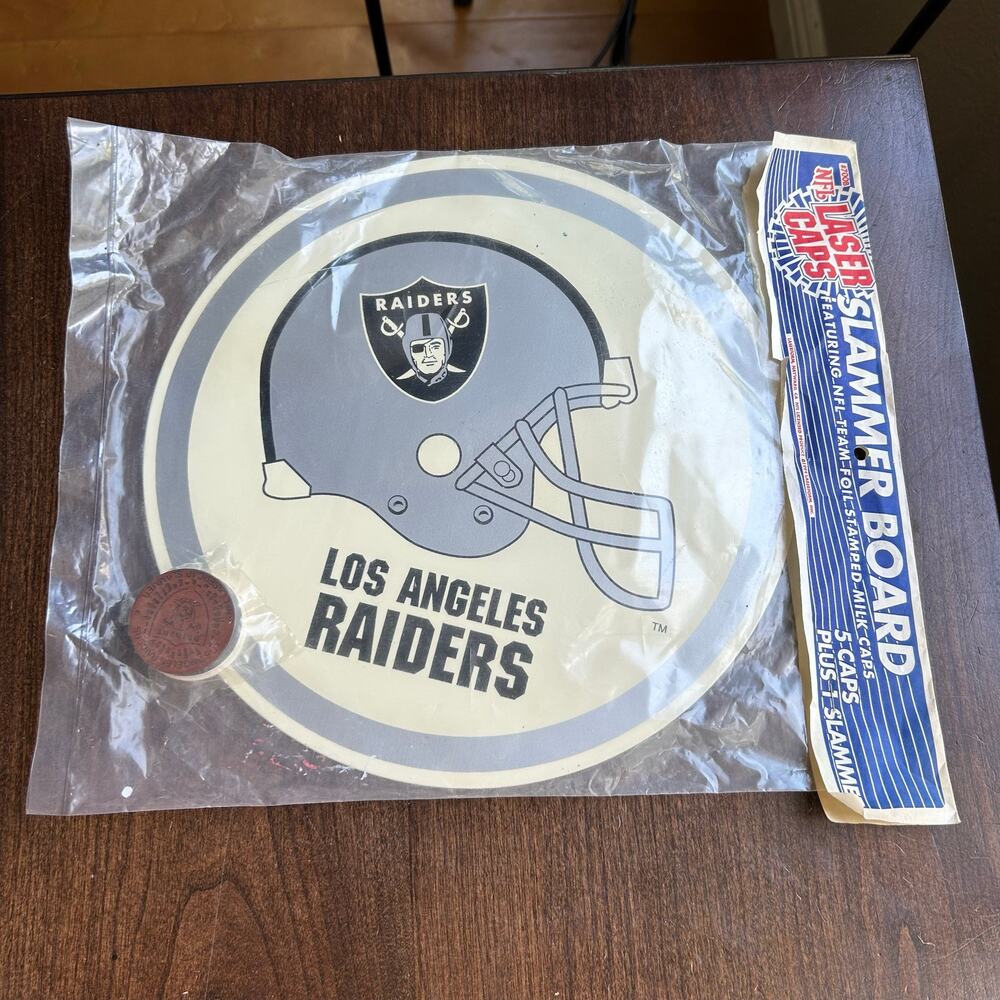 NOS vintage 90’s Los Angeles Raiders pogs slam board and laser cut pogs